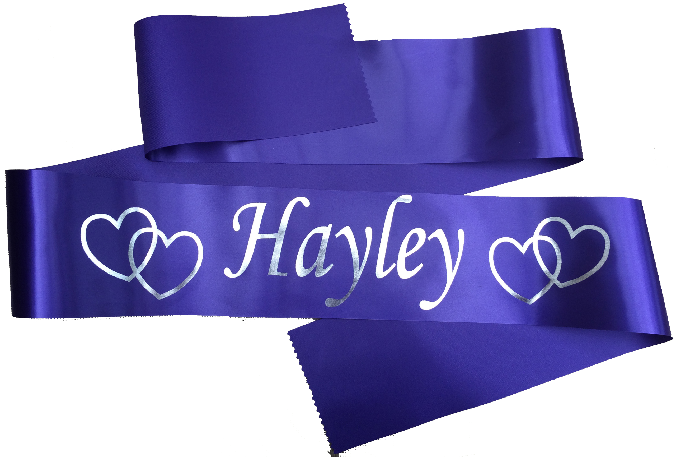 A purple customised sash with silver text - Hayley and 2 intertwined hearts